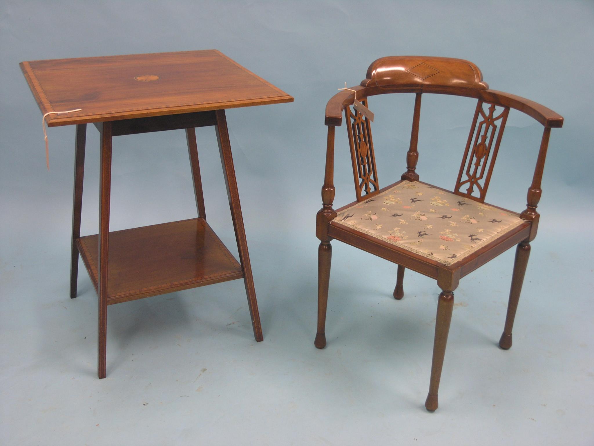 Appraisal: An Edwardian inlaid mahogany centre table square cross-banded top on