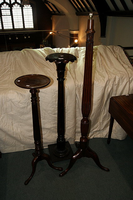 Appraisal: A MAHOGANY STANDARD LAMP with reeded column and two other