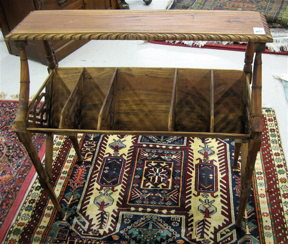 Appraisal: MAHOGANY BOOKRACK CONSOLE TABLE having a narrow top raised over