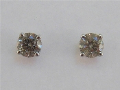 Appraisal: A pair of single stone diamond ear studs each brilliant