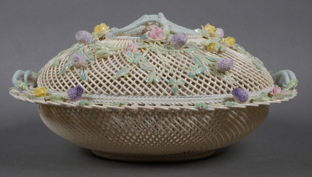 Appraisal: Belleek Masterpiece Collection basket Four-strand two pad Belleek mark on