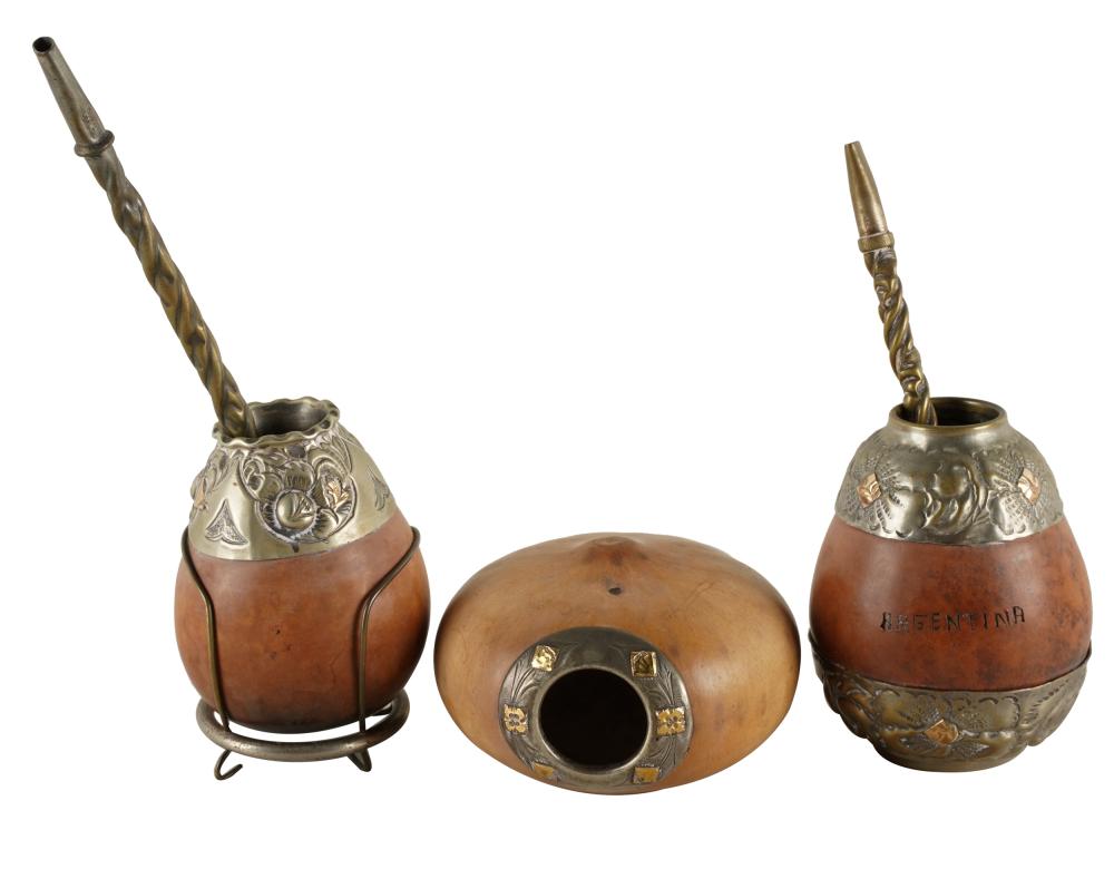 Appraisal: THREE METAL-MOUNTED GOURDSone marked Argentina together with two Industria Argentina