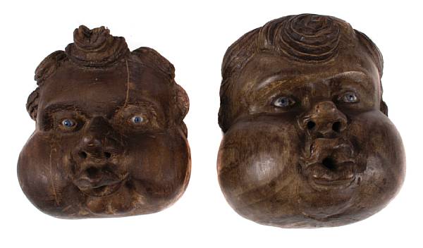 Appraisal: A group of four Italian carved wood masks with glass