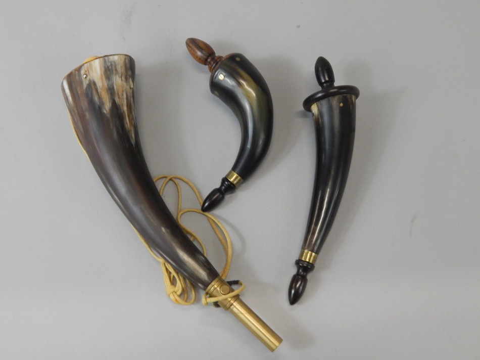 Appraisal: Three horn powder flasks to include two small examples with