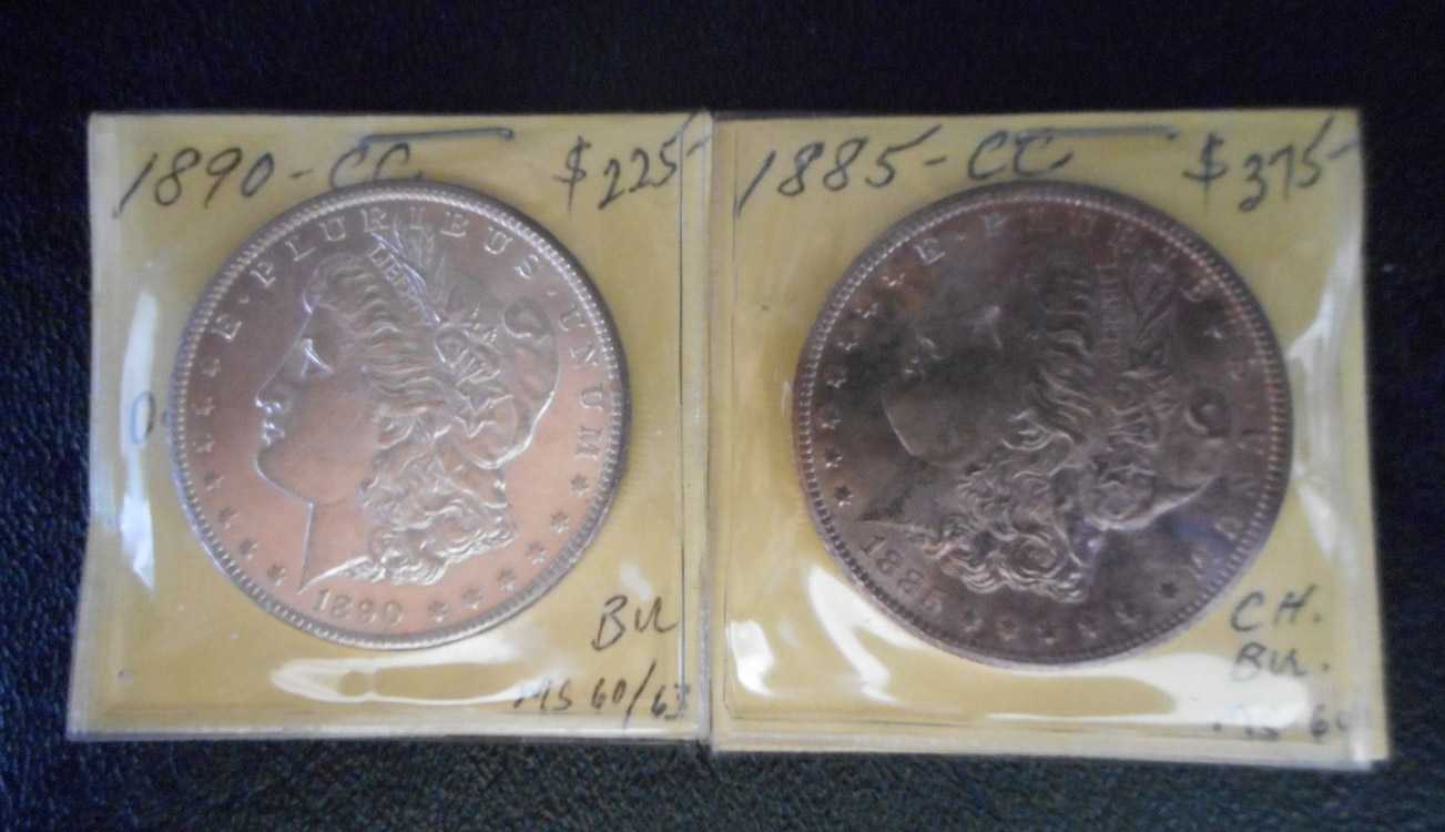 Appraisal: TWO CARSON CITY SILVER MORGAN DOLLARS -CC and -Cc