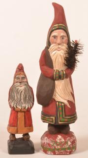 Appraisal: Folk Art Santa carving by Johnathon Bastian Two contemporary Folk