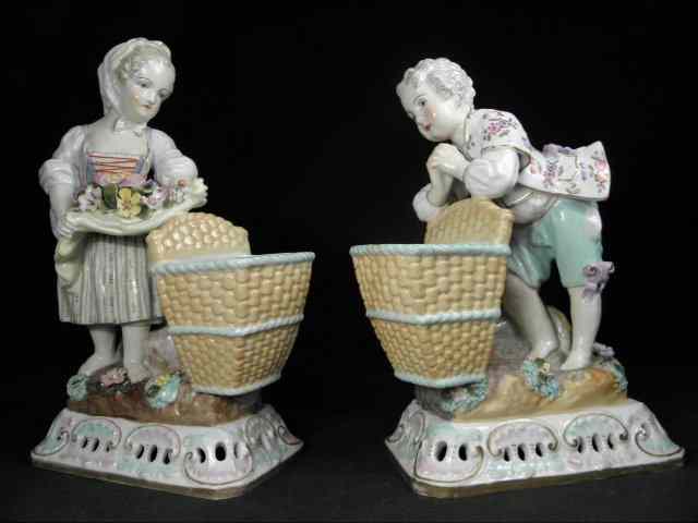 Appraisal: Lot of two Meissen German porcelain figurines Includes a boy