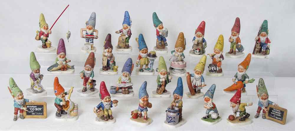 Appraisal: LOT OF CO-BOY FIGURINES BY GOEBEL To include two sign