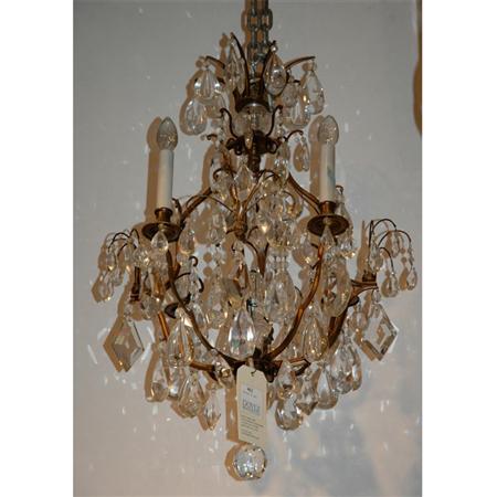 Appraisal: Louis XV Style Gilt-Metal and Cut Glass Four-Light Chandelier Estimate