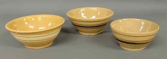 Appraisal: Three yellowware mixing bowls- h x dia dia dia