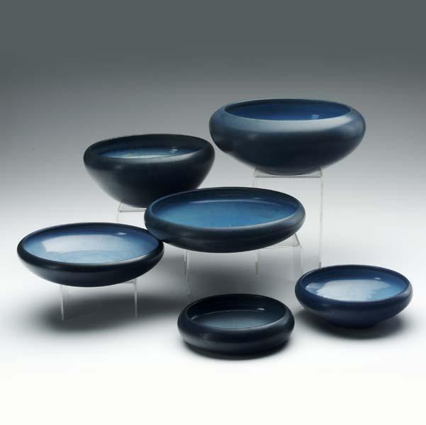 Appraisal: MARBLEHEAD Six low bowls covered in matte blue glaze From