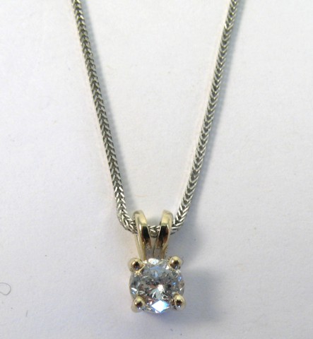 Appraisal: DIAMOND AND WHITE GOLD PENDANT NECKLACE The pendant is suspended