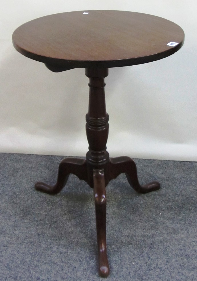 Appraisal: A th century mahogany snap top occasional table the circular