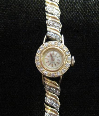 Appraisal: Lady's karat yellow gold and diamond wristwatch UniversalCircular case white