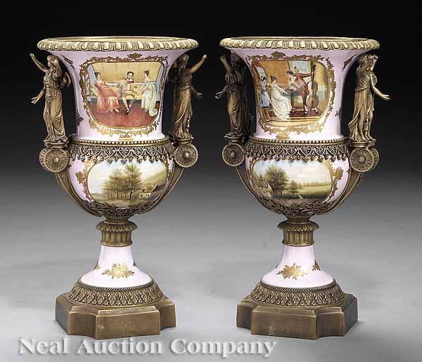 Appraisal: A Pair of Monumental Bronze-Mounted Porcelain Urns mid- th c