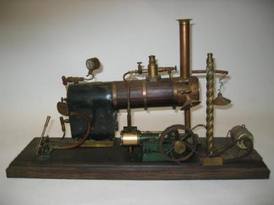 Appraisal: A stationary steam engine with horizontal coal fired boiler to