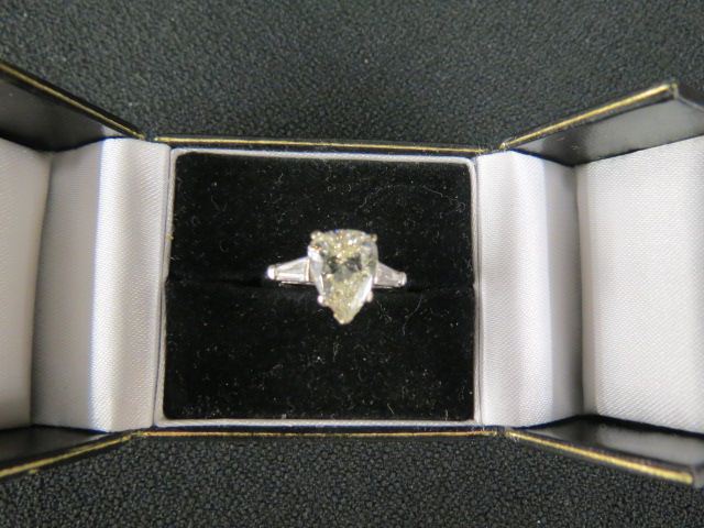 Appraisal: Carat Diamond Ring pear shapewith baguettes on each side with