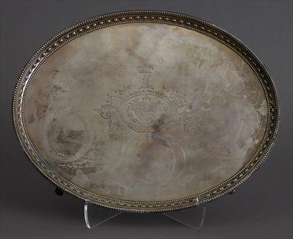 Appraisal: GEORGE III ARMORIAL SILVER OVAL FOOTED TRAY John Schofield London