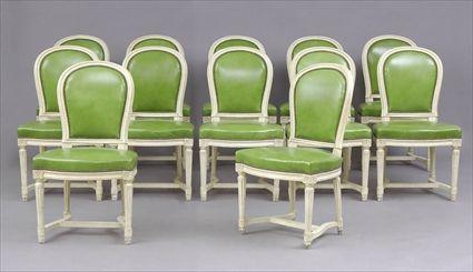 Appraisal: SET OF TWELVE LOUIS XVI-STYLE WHITE-PAINTED CHAIRS Each with arch-shaped