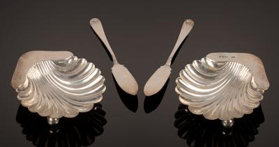 Appraisal: A pair of Victorian silver butter shells and the matching