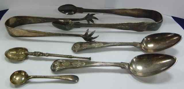 Appraisal: A pair of George IV silver sugar tongs London another