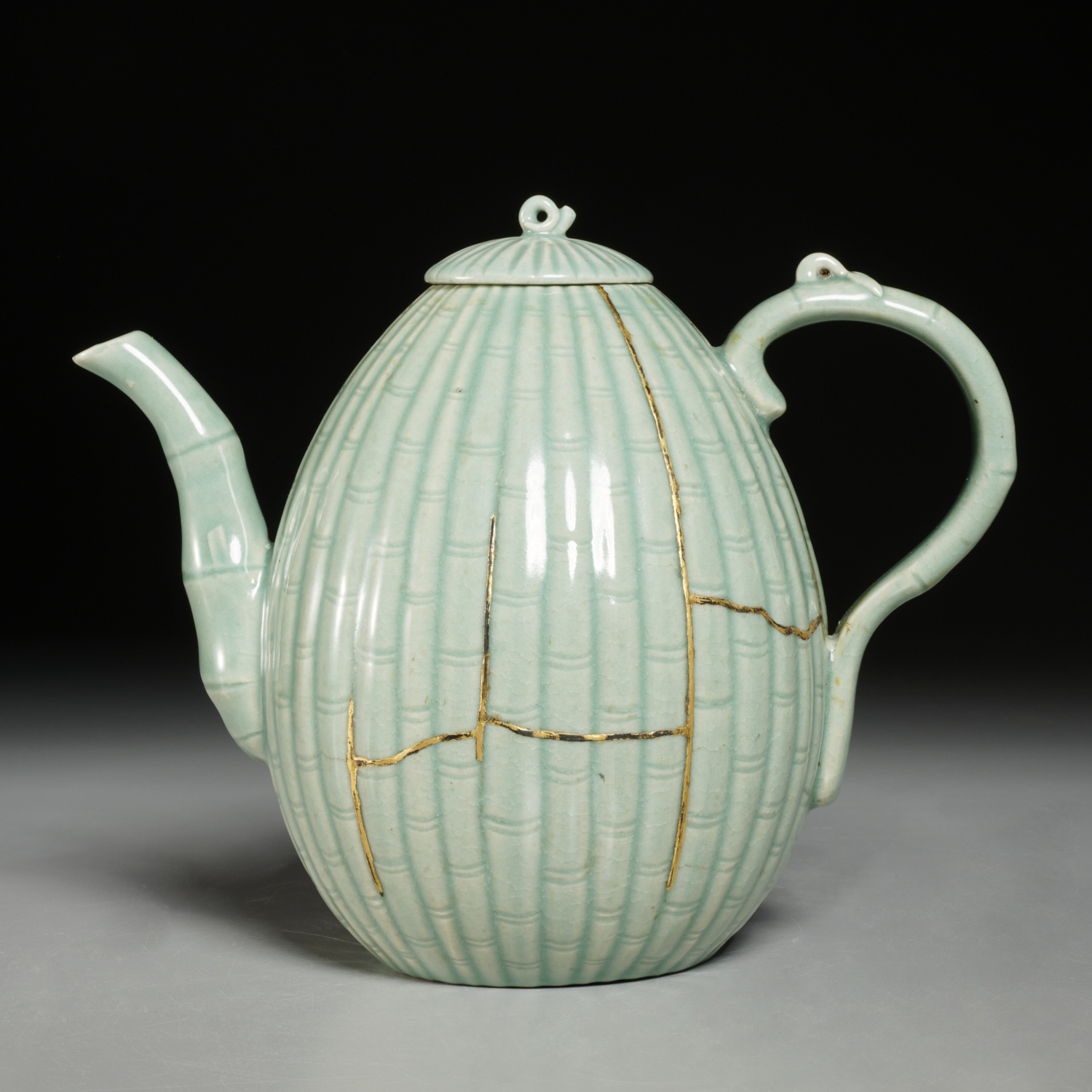 Appraisal: KOREAN CELADON MELON-SHAPED EWER Possibly Goryeo Dynasty - CE Korea