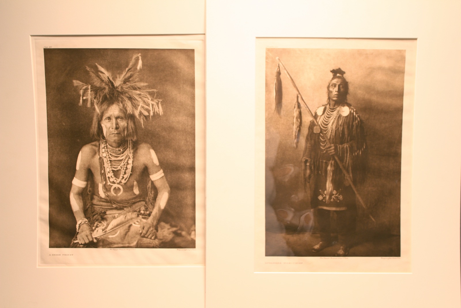 Appraisal: TWO UNFRAMED EDWARD S CURTIS PHOTOGRAVURES Circa A Snake Priest