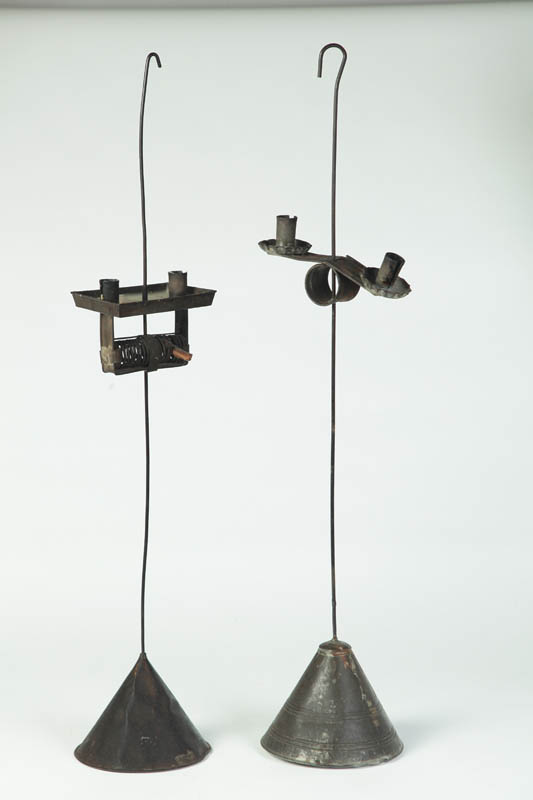 Appraisal: TWO LIGHTING DEVICES American th century Similar with weighted tin