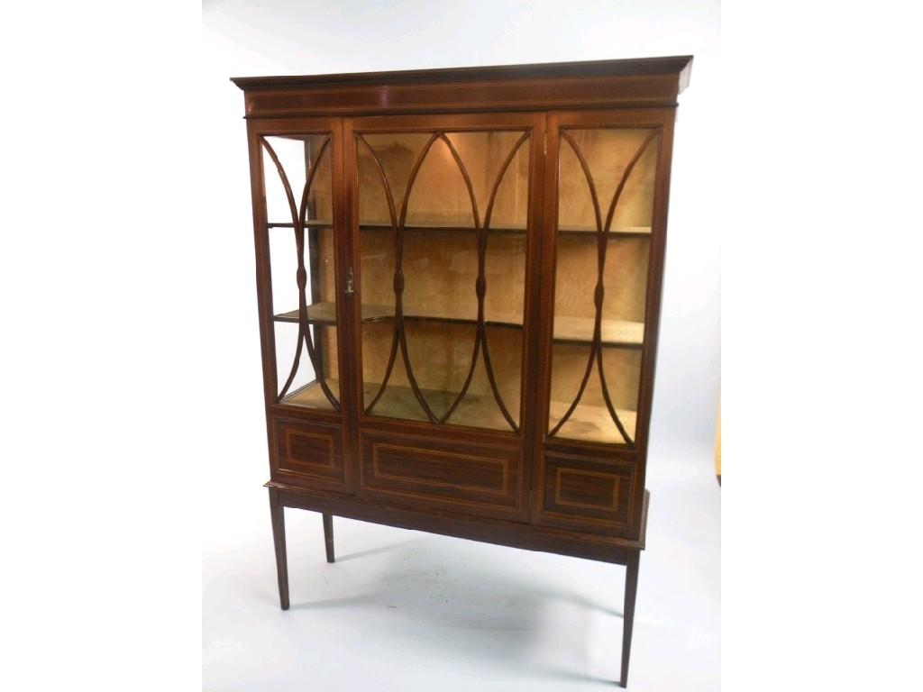 Appraisal: A Edwardian mahogany and chequer banded display cabinet with a