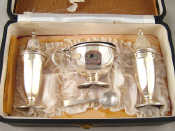 Appraisal: A three piece silver cruet set with spoon Sheffield in