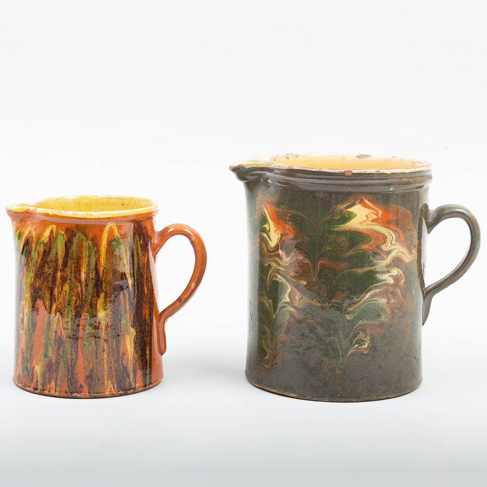 Appraisal: Two American Multicolored Glazed Stoneware Jugs The larger in high