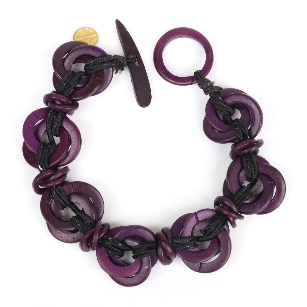 Appraisal: MONIES GERDA LYNGGAARD WOVEN WOOD CIRCLE DESIGNER BRACELET WITH PURPLE