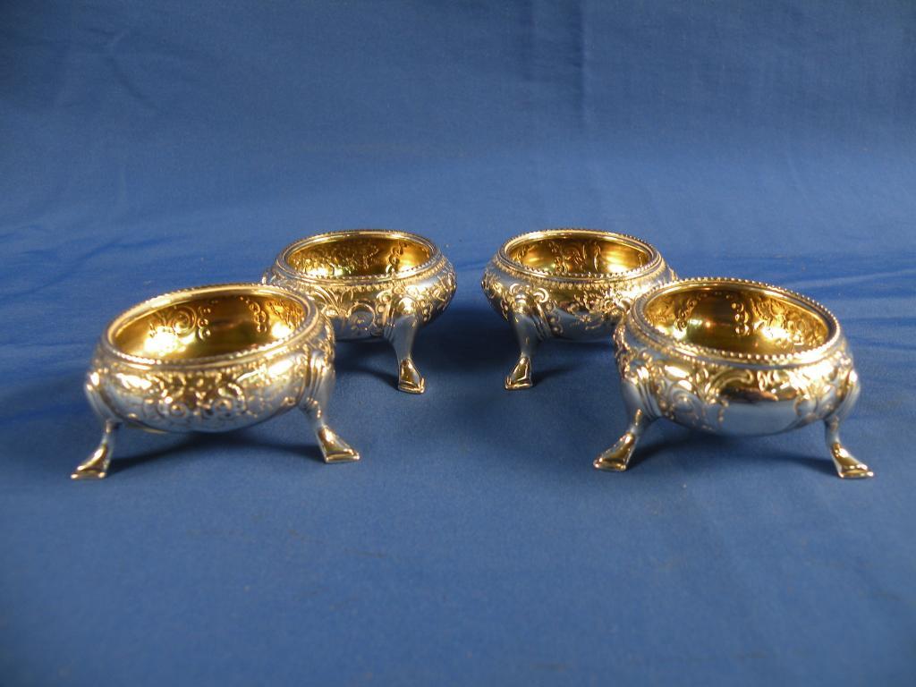 Appraisal: A set of four Victorian silver table salts each of