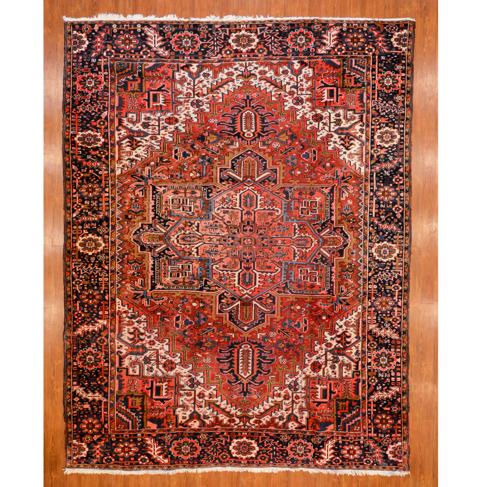 Appraisal: HERIZ RUG PERSIA X th century hand-knotted wool pile