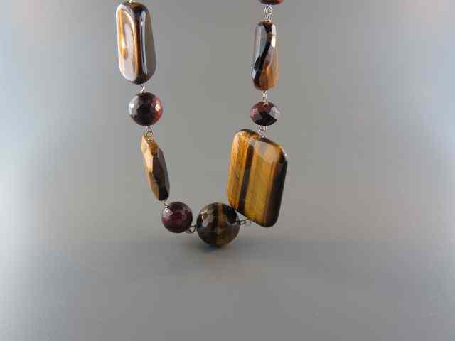 Appraisal: Sterling Silver Tigereye Necklace rich browns reds with twisted rope