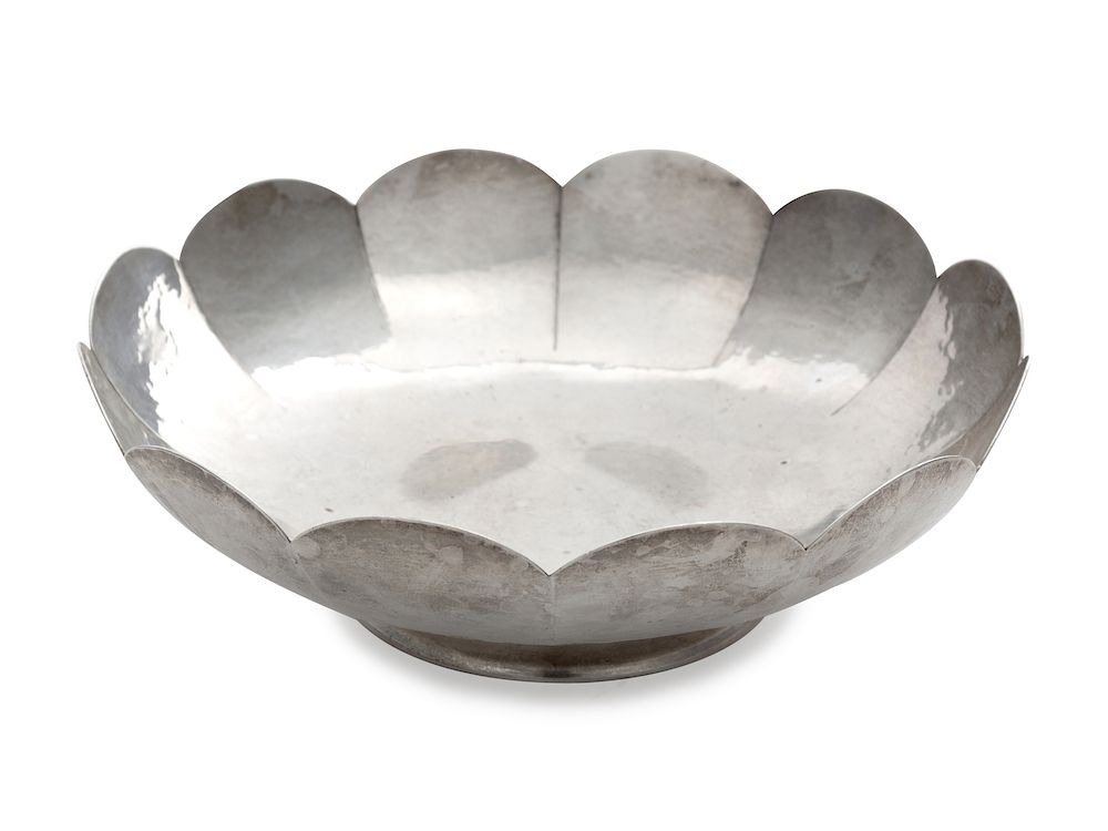 Appraisal: A Silver Bowl together with a silver-plate tea A Silver