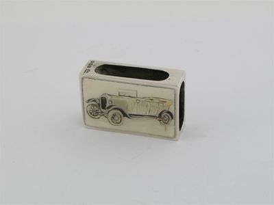 Appraisal: A modern matchbox cover decorated with an open touring car