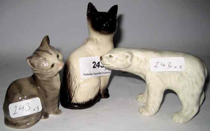 Appraisal: Beswick Seated Siamese Cat Grey Seated Kitten and Unmarked Model