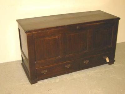 Appraisal: AN OAK PANELLED CHEST with hinged plank lid the fasica