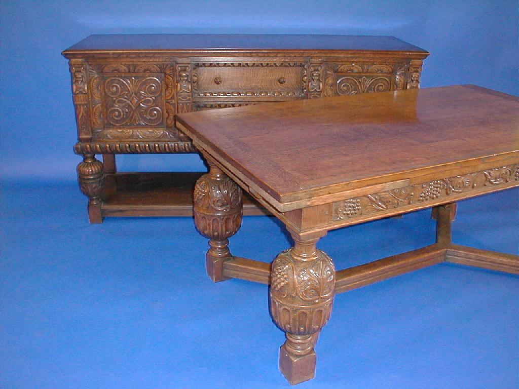 Appraisal: A heavy oak draw leaf refectory table with boulbus carved