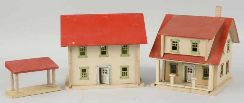 Appraisal: Lot of Small Wooden Schoenhut Houses Description Both with metal