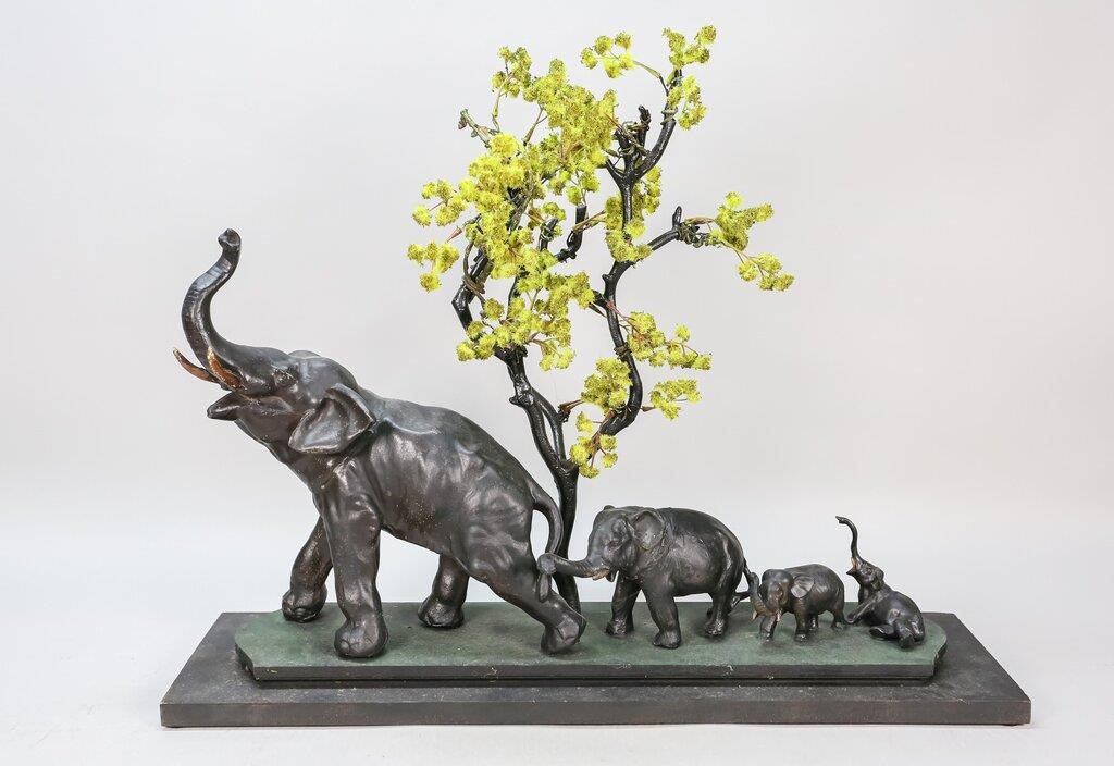 Appraisal: Metal statue of elephants and tree on wooden base Minor