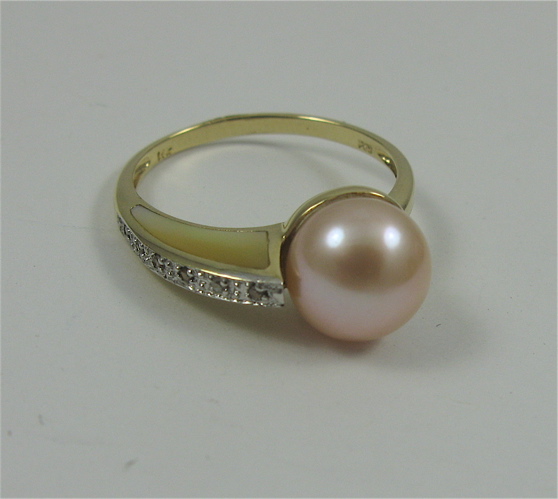 Appraisal: PINK PEARL DIAMOND AND K GOLD RING set with a