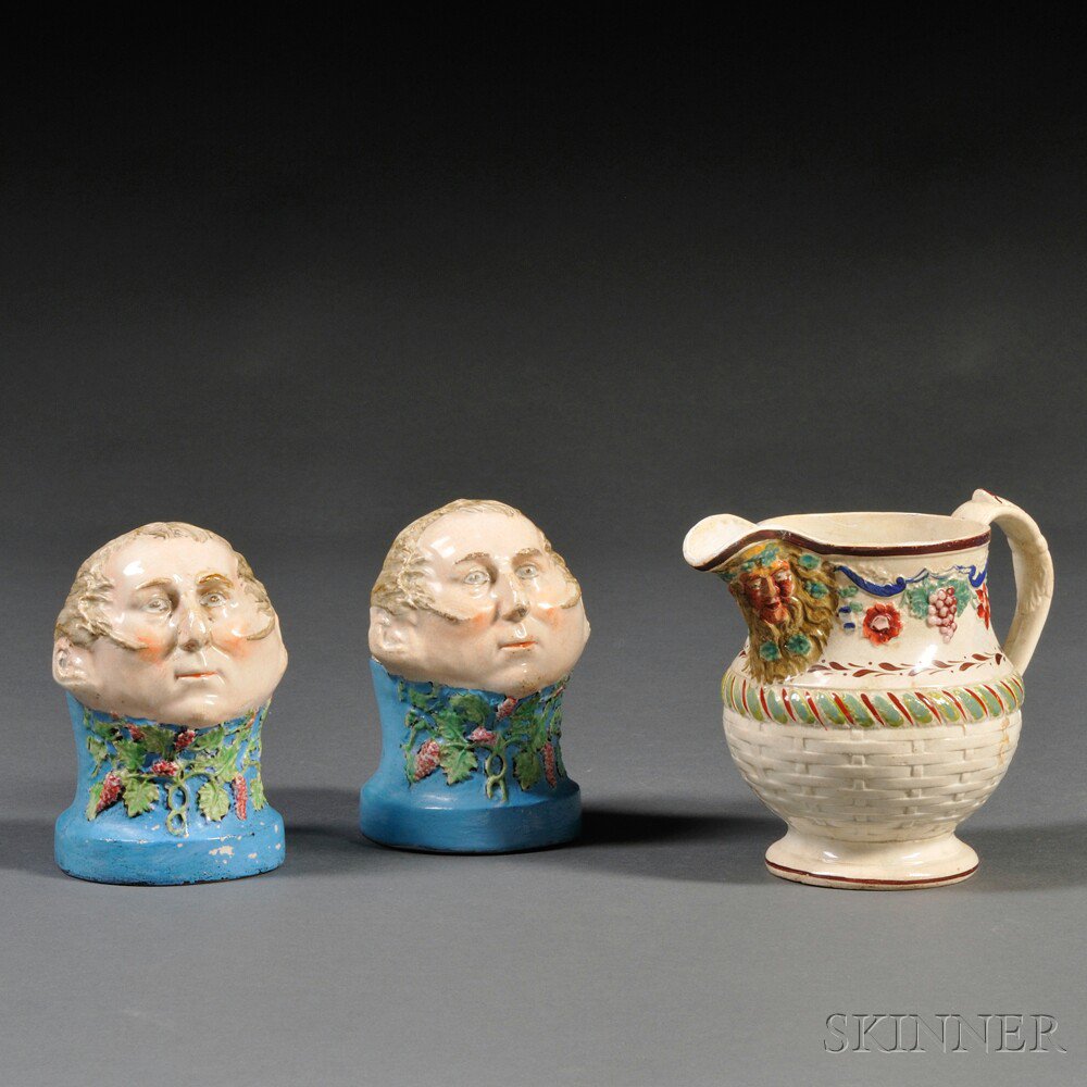 Appraisal: Pair of Staffordshire Pearlware Man's Head-form Window Stops and a