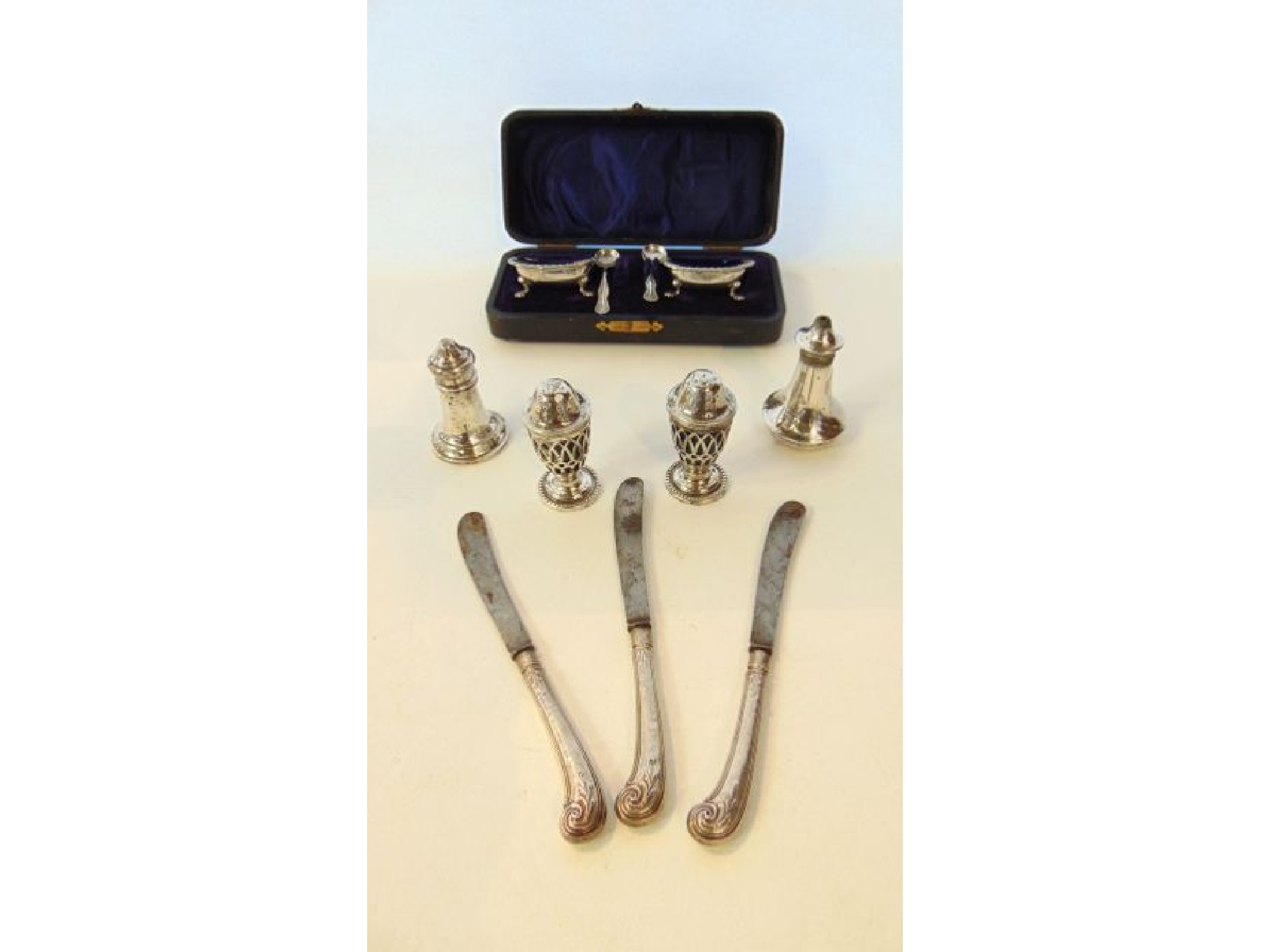 Appraisal: A cased Edwardian silver cruet set William Devenport Birmingham -