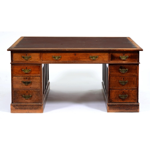 Appraisal: An Edwardian partner's desk with fabric inlet walnut top and