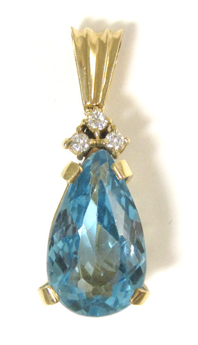 Appraisal: BLUE TOPAZ AND DIAMOND PENDANT k yellow gold with three