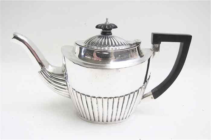 Appraisal: ENGLISH STERLING SILVER TEAPOT hallmarked British sterling city Chester year