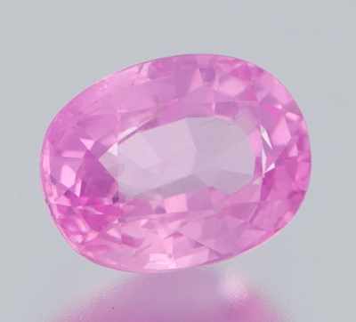 Appraisal: An Unmounted Pink Sapphire Carat Oval faceted cut x Origin