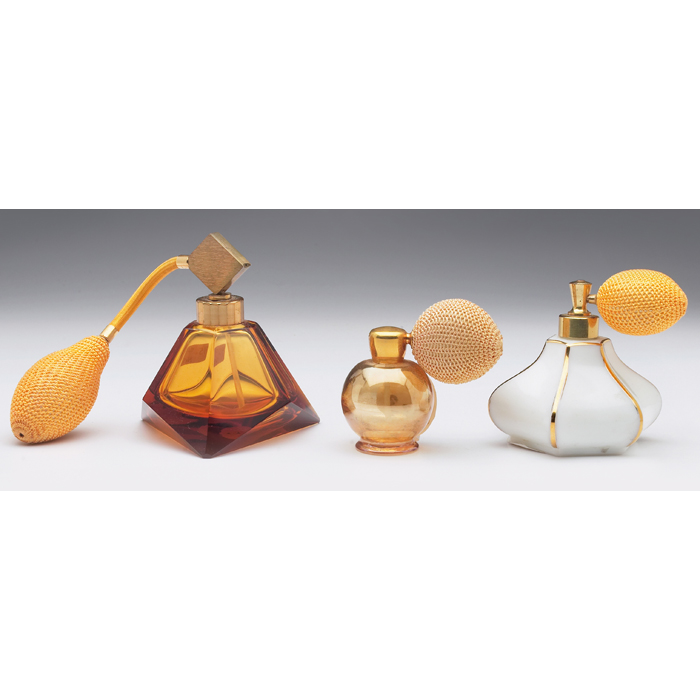 Appraisal: Art Glass perfume atomizer unusual faceted shape in amber colored